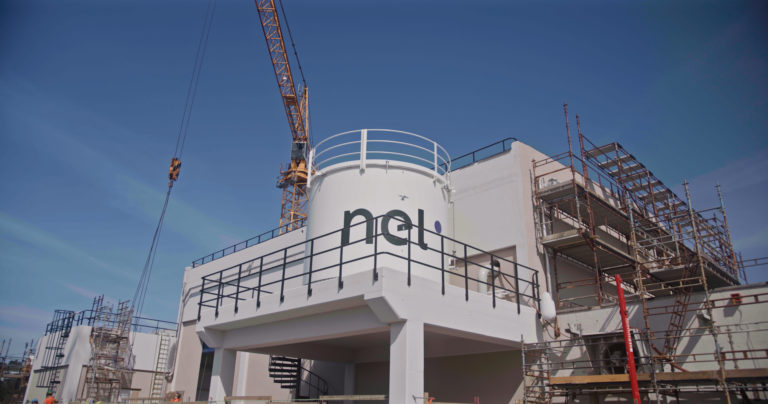 Nel Electrolyser outdoor site in Glencore in front of a blue sky